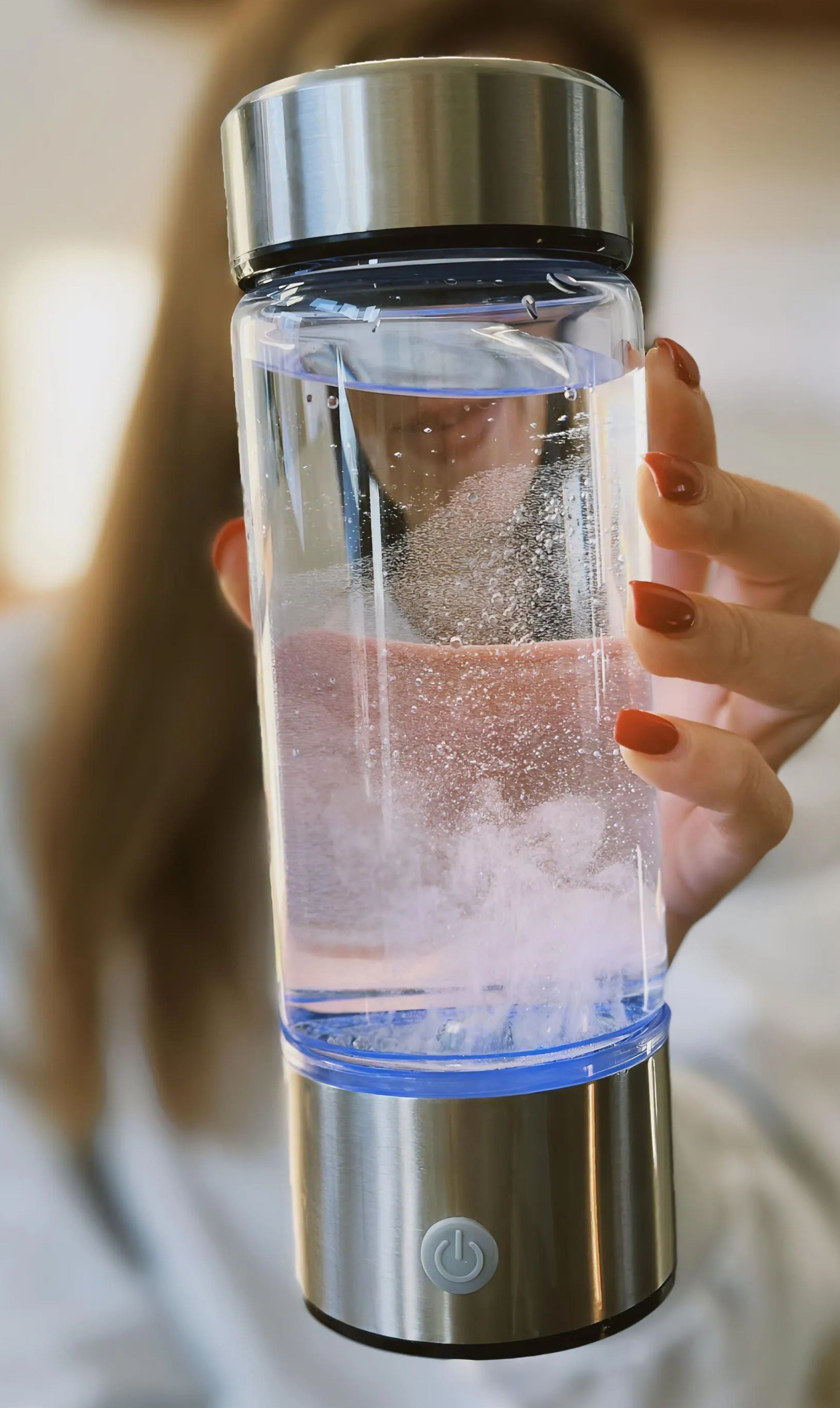 customer showing H2Next Hydrogen Water Bottle